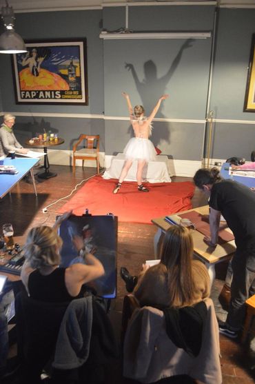 Burlesque performer Candi Liquour poses for Love2Sketch art class in a ballet outfit.