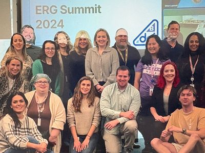 Group photo of diverse attendees at the ERG Summit 2024.