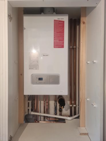 New boiler install in bathroom cupboard