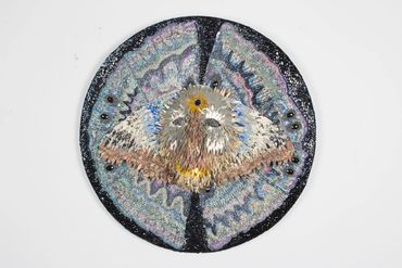 "Mothman" 
Wood, Paper, Sequin, Bead, Mirror
2017