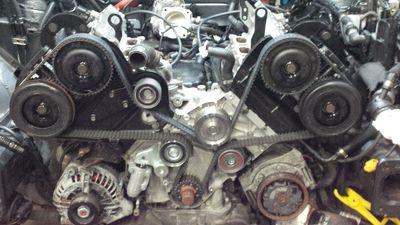 Fully installed timing belt on pulleys.