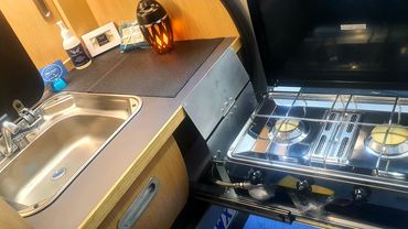 Leisure Campers, cool camper trailer hire. Mandurah, Perth, Bunbury, and Peel. Convenient kitchen.