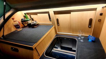 Leisure Campers, cool camper trailer hire. Mandurah, Perth, Bunbury, and Peel. Convenient kitchen.