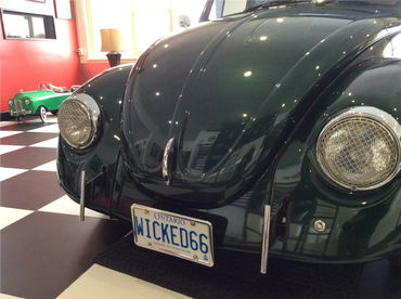Front hood of green VW Bug