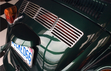 a VW Bug engine lid with chrome air vents