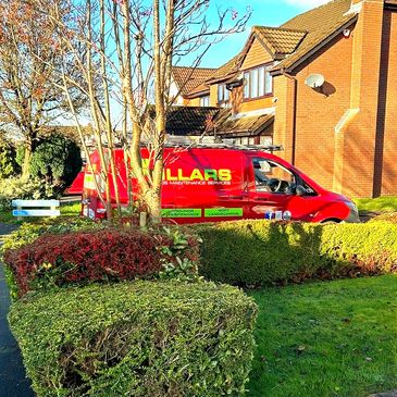 Red Millars branded van on an estate visiting customers.
