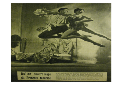 Black and white photo of two ballet dancers mid-air in a dramatic pose.