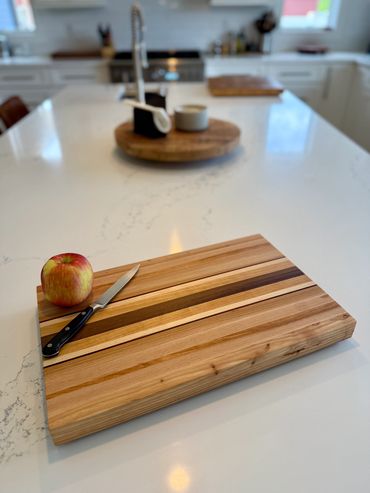 Hickory, Hard Maple, Walnut, Padauk and Cherry Edge Grain Cutting Board