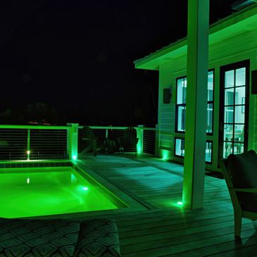 Pool lit up green at night