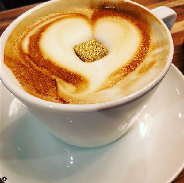 Cappuccino with a 24 carat gold plated and edible sugar cube.