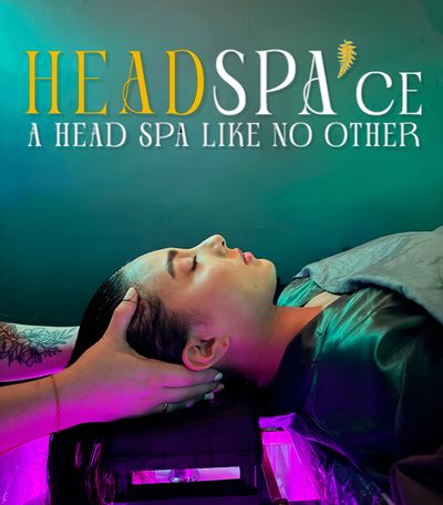 A woman enjoying a relaxing head spa treatment in a serene setting.