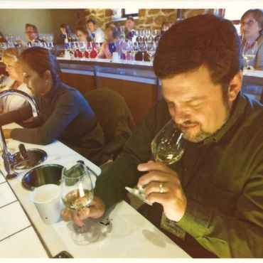 Ben in his prior life at a wine seminar in Denver, CO.