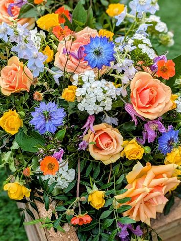 Blue funeral flowers for a service in Chalbury, Wimborre Dorset.