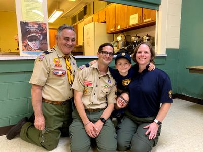 The Friesner Family at a Cub Scout meeting.