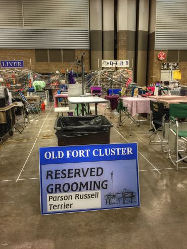 Reserved grooming area for Parson Russell Terrier at a dog show.
