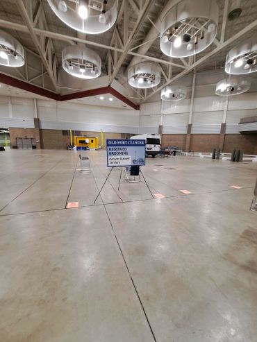 Spacious indoor venue with reserved grooming area for Parson Russell Terriers.