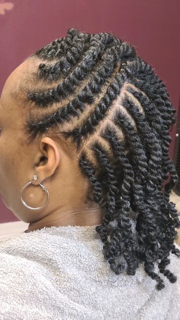 Conflicted with transitioning to natural hair? Try the Double Strand Flat Twist Updo with Extensions