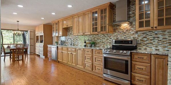 Moraga home with open concept kitchen with stone counters.
