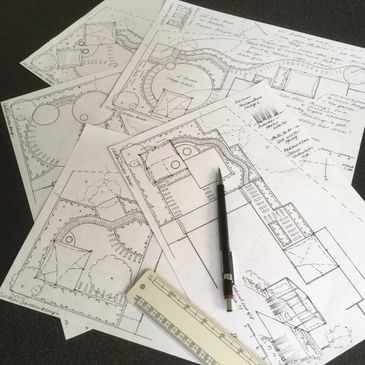 garden design drawings with pencil and ruler