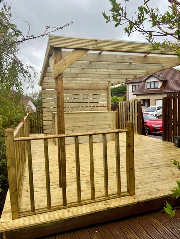 Decking with clear canopy and built in bar area