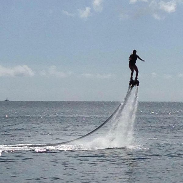 Dr. Rebecca Laginski Chiropractor loving life with this unusual water sport during vacation