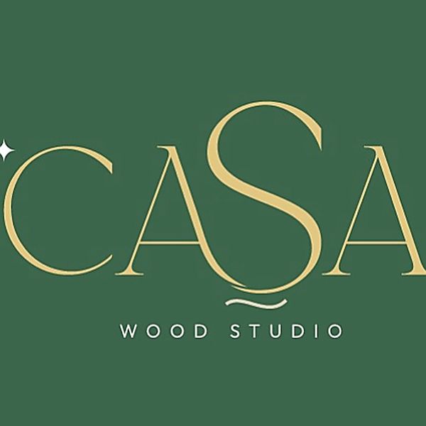 Elegant logo for Casa Wood Studio with gold text on a green background.