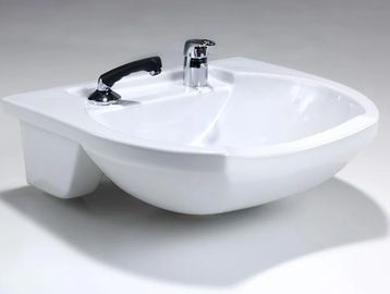 REM barbers frontwash basin. A porcelain white frontwash barbers sink.  Traditional ceramic basin.