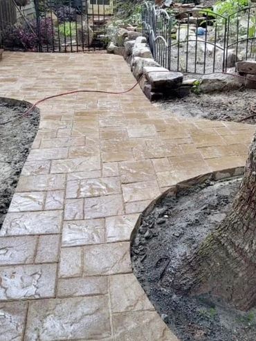 luxury designed paver patio and pathway