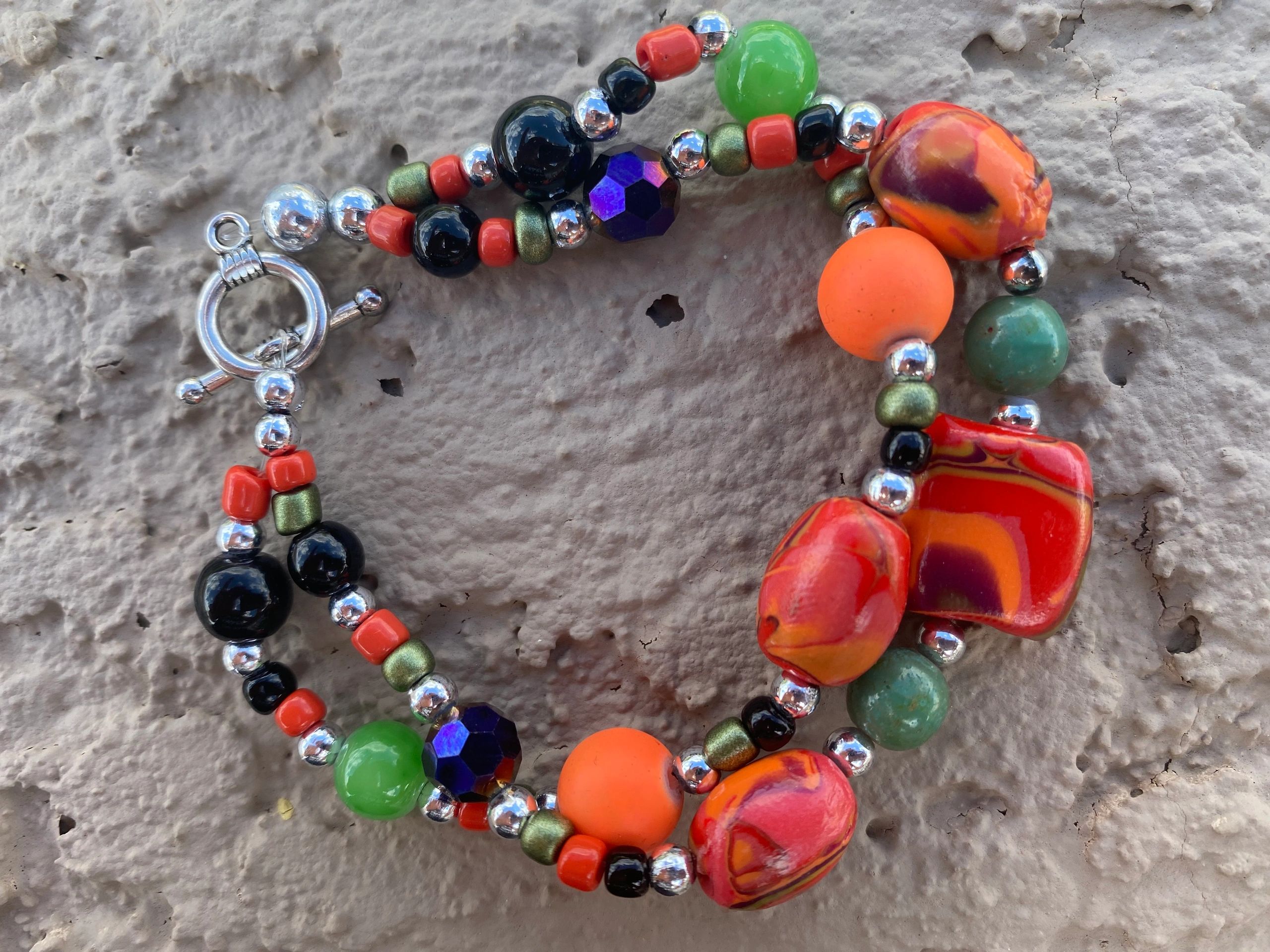 One of our best sellers!  The colors of a sunset goes with so many outfits! Great summer & fall item