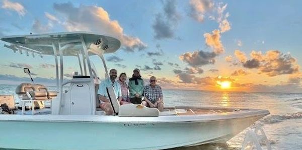 Guests aboard a Treasure Seekers Shell Tours boat enjoy a beautiful Southwest Florida sunset near Marco Island. The guided shelling adventure explores the waters of the Ten Thousand Islands, combining scenic views, local knowledge, and unforgettable coastal experiences.