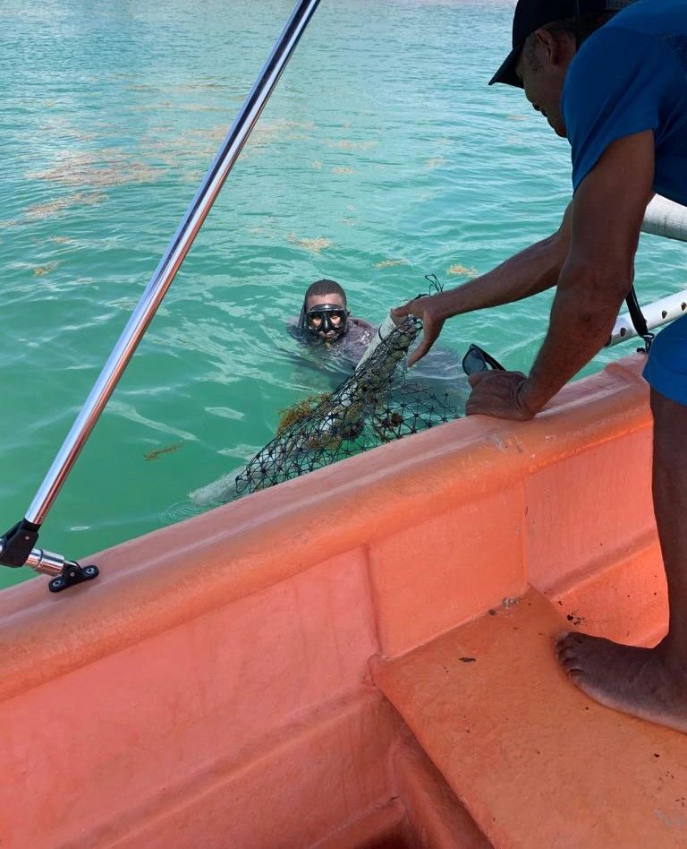 Fishermen doing ocean clean up