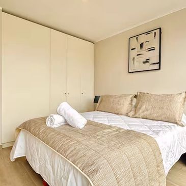 Dormitorio principal de MillarStays cerca de Beauchef, Parque O’Higgins y Santander Arena