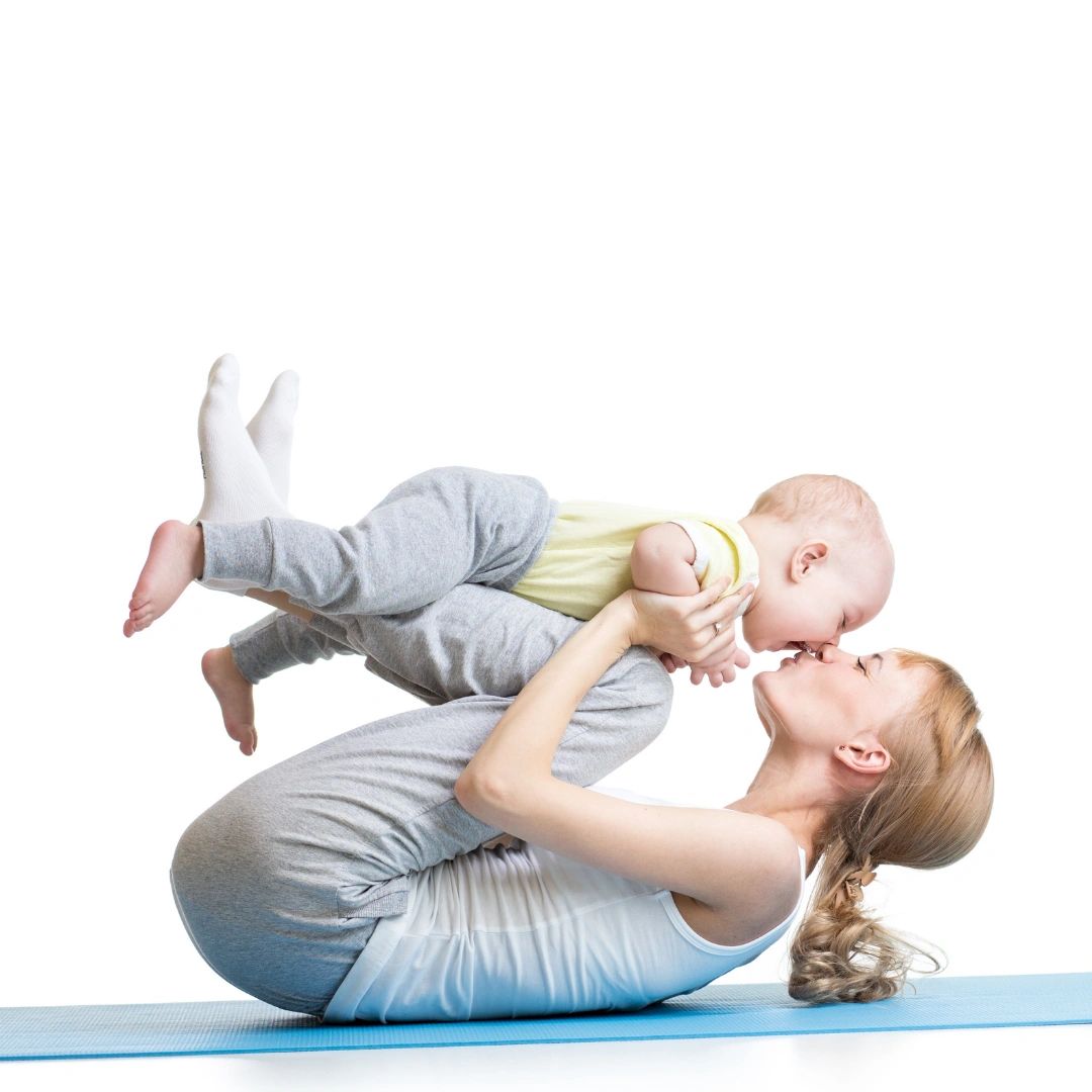Parent and baby doing Baby Yoga