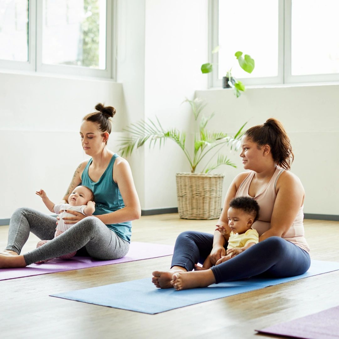 Parents and Babies completing Baby Yoga