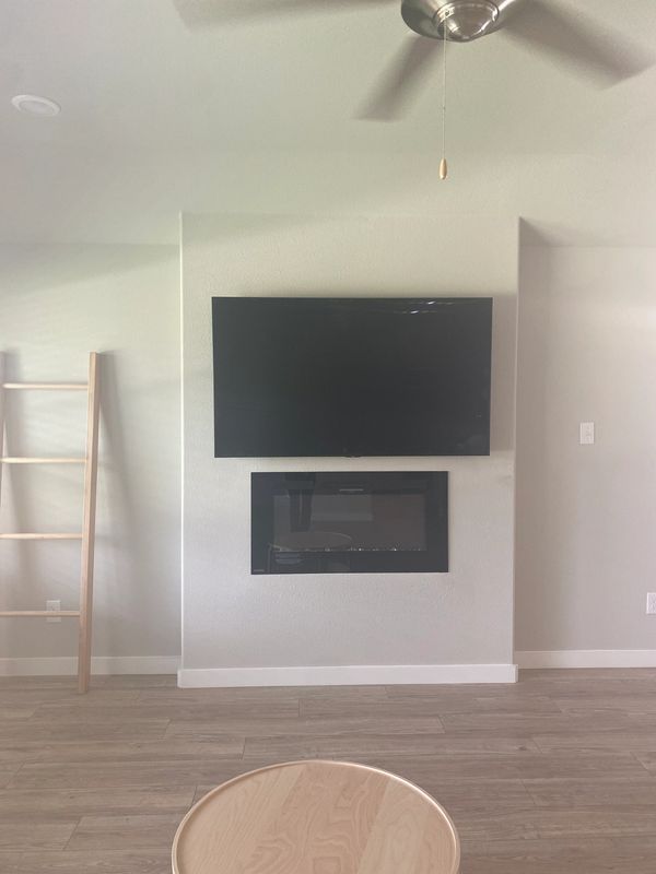 TV mounted in den.