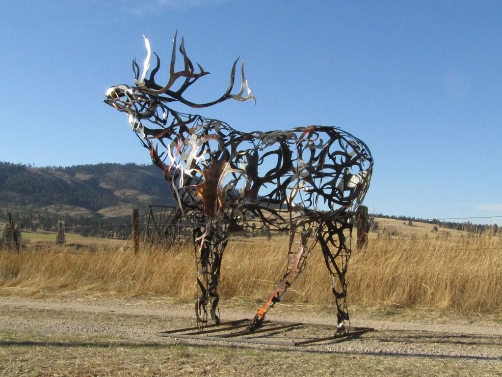 Metal bull elk sculpture: Laura Jean Welding's Montana wildlife artistry.
