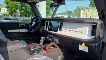 Interior of a Ford Bronco showcasing its dashboard and central controls.