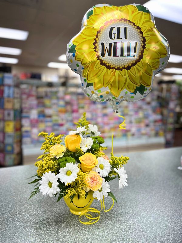 A cheerful yellow floral arrangement with a "Get Well" sunflower balloon.