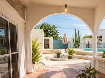Large terracotta patio overlooking the spa at Chelem Spa & Athletic Club with Pickleball in Chelem /