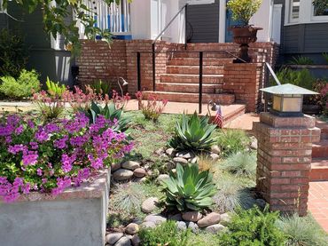 Low Maintenance Front yard redesign landscape with rocks,