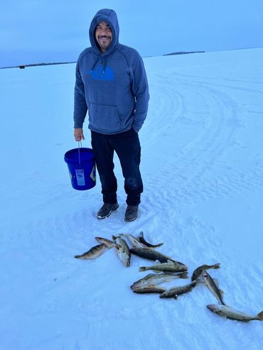 Angle North's Colin MacRae with his daily walleye catch