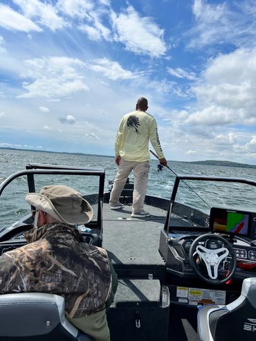 Angle North's Captain MacRae, on his boat fishing Lake Minnetonka, MN.