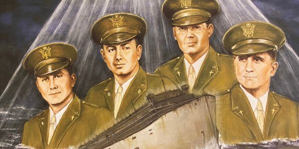 Portrait of four WWII military officers in uniform.