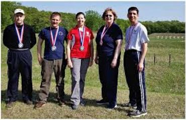Three Position Medal Winners:
Left to right: Pete Fiori (Silver), Brad Yliniemi (Gold), Denise Lorin