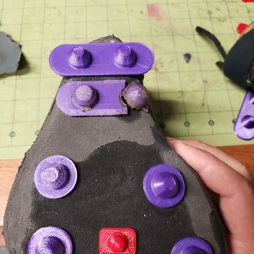 Inside view of the soccer cleat studs, as they were shaped to fit the sole.