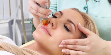 laser hair removal on a woman's upper lip