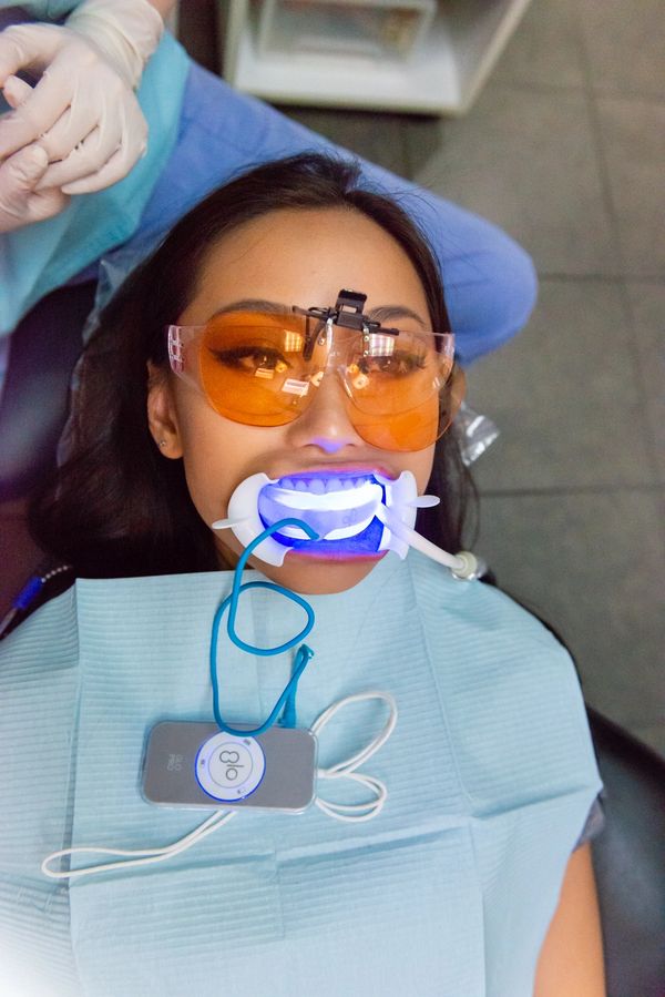 A dental patient undergoing treatment
