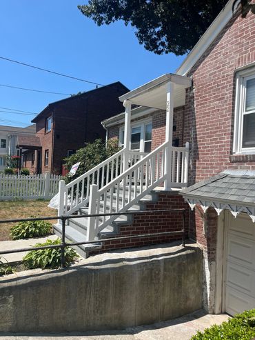 granite and brick stairs with Wolf vinyl railing boston, ma
