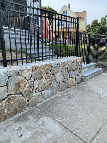 Stone retaining wall built in Wellesley, MA
