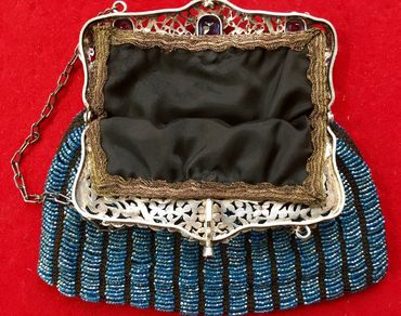 After restoration of antique bead-knitted swag purse, with Japanese kimono silk lining.